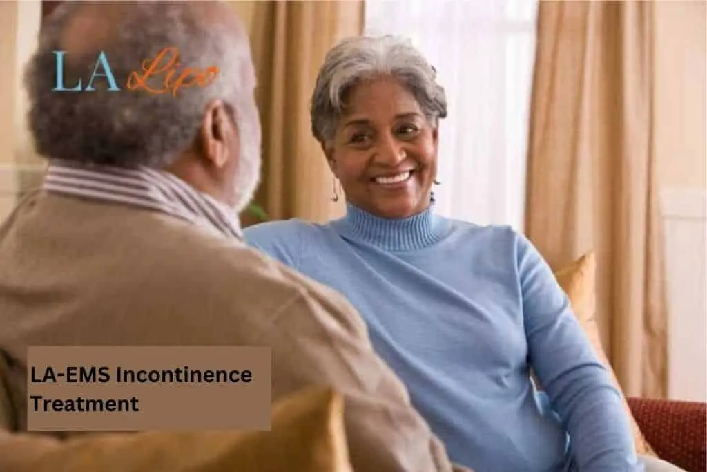 Couple sat smiling at each other - LA-EMS treatment Kings Langley